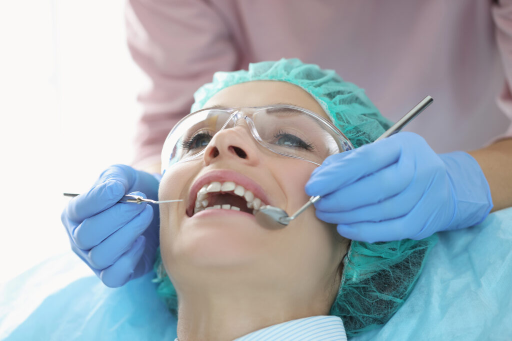 Dental exam with patient and tools, dentist in Lynn Haven, FL