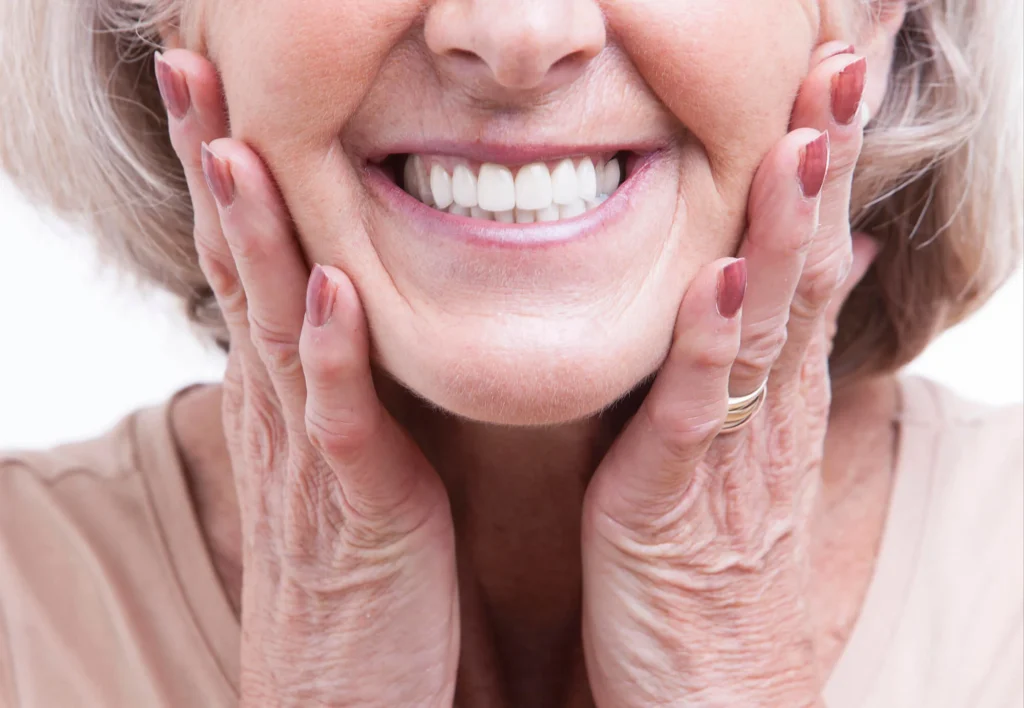 Senior smiling with healthy teeth, dentist Panama City, FL