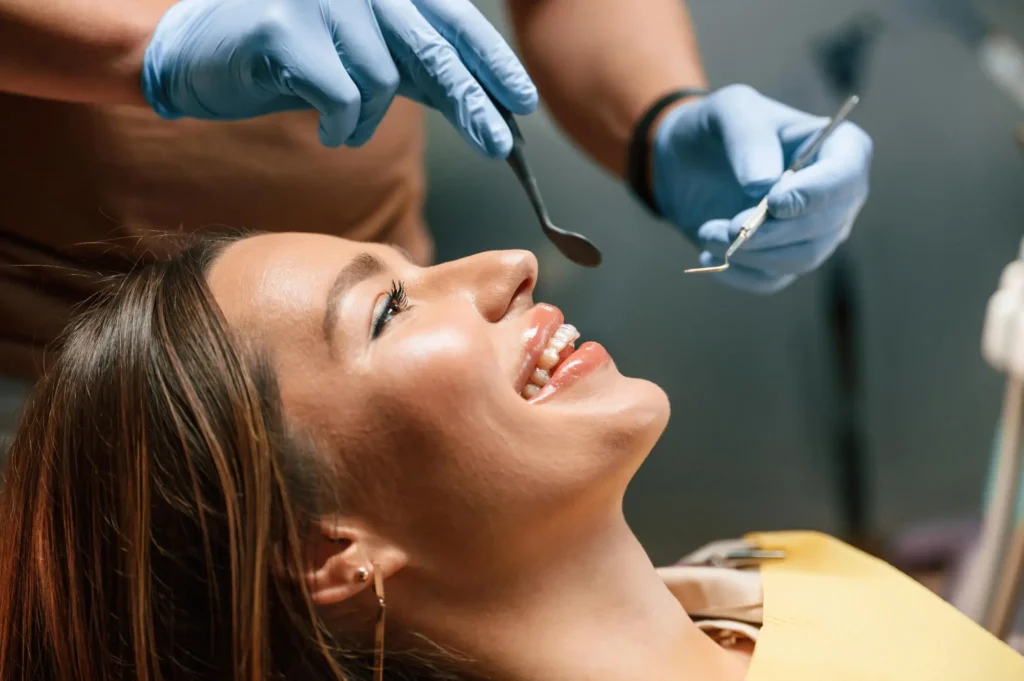 dentist checking Tooth Crowns in Panama City FL