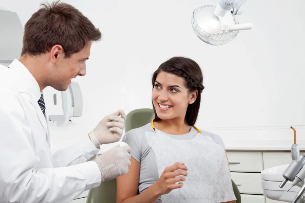 Best dentist near you in Panama City and smiling patient.