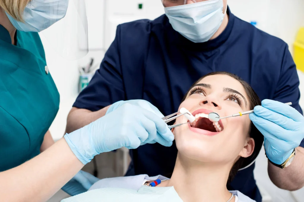 Dentist-Treating-Patient-Teeth-at-Dentist-Panama-City-FL