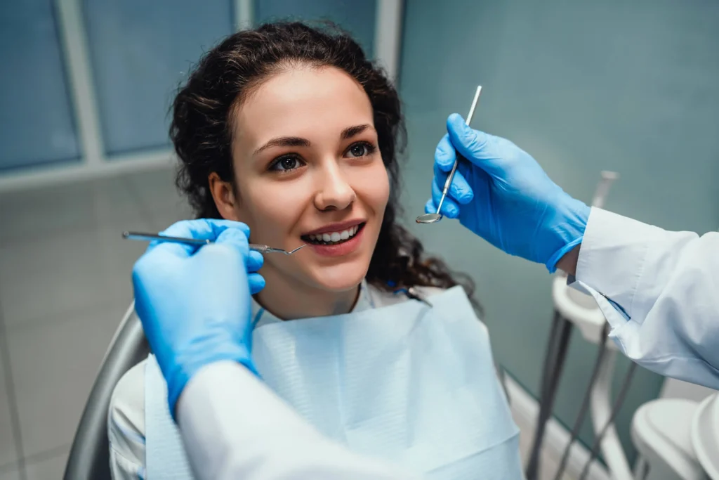 Woman-Smiling-During-Exam-at-Dentist-Panama-City-FL